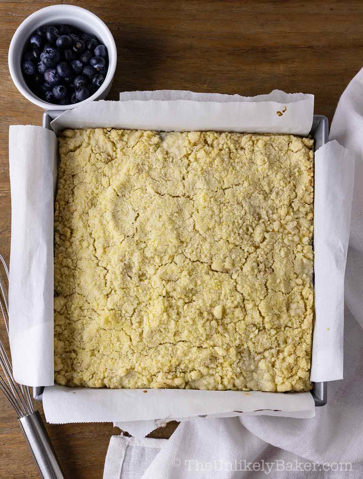 Freshly baked blueberry cream cheese crumb bars.