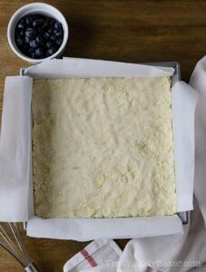 Shortbread crust in a pan.