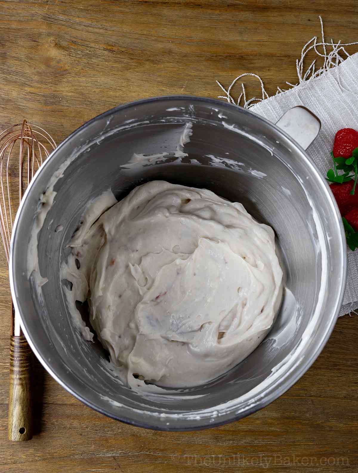 Strawberry cream cheese mixture in a bowl.