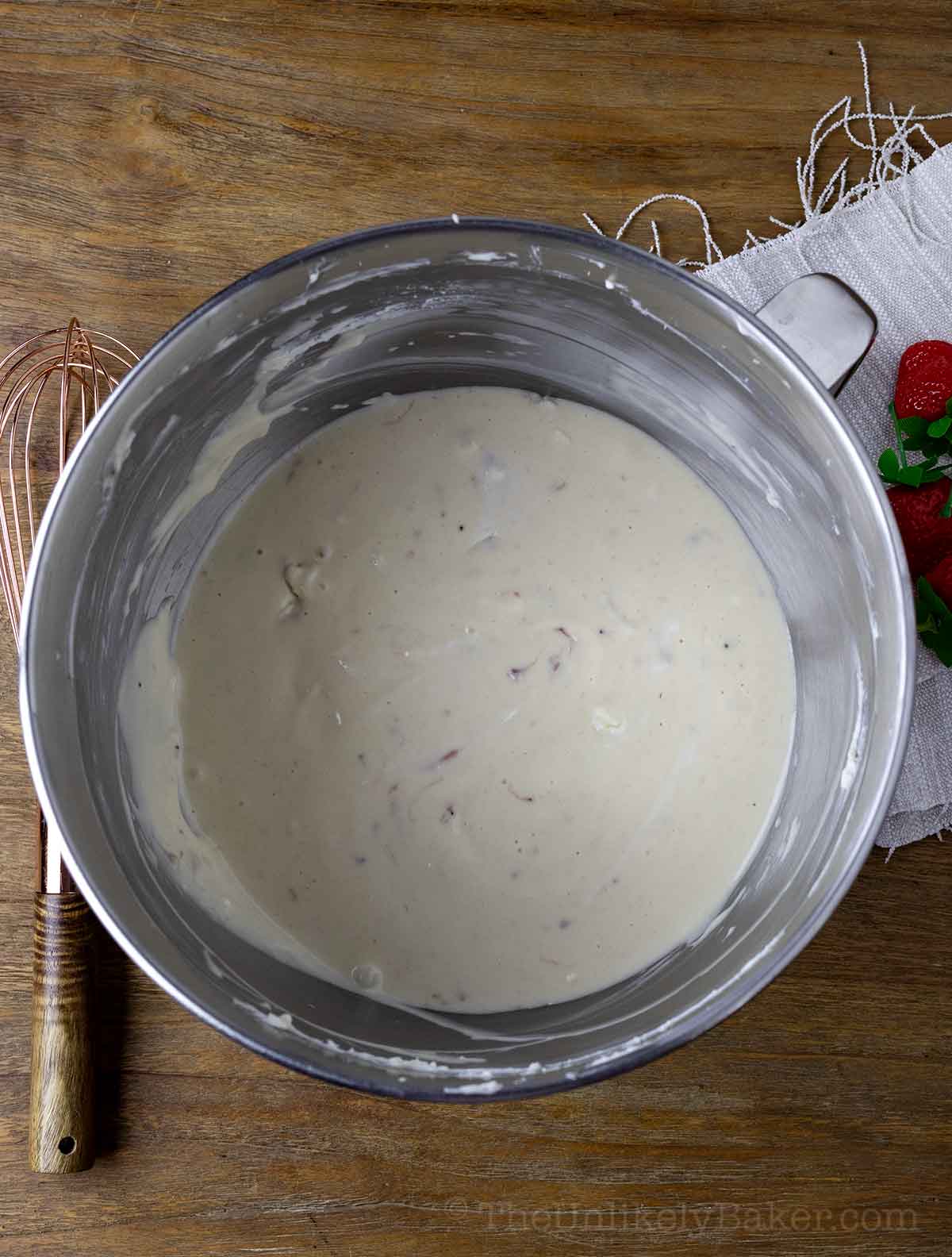 Strawberry cheesecake filling in a bowl.