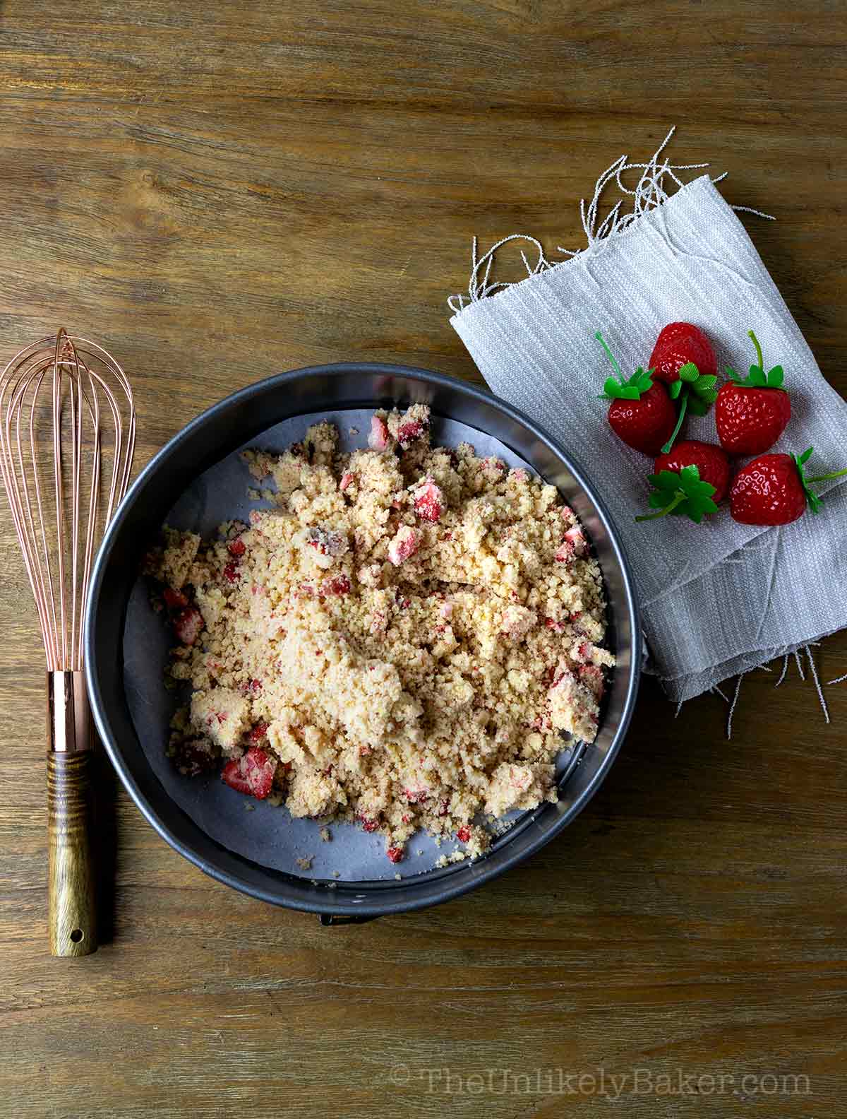 Shortbread crust dough in a pan.