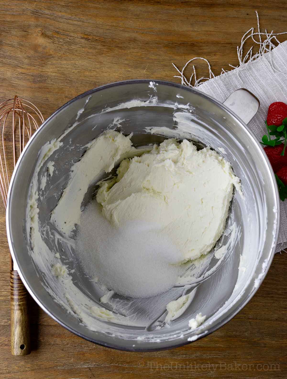 Sugar added to cream cheese.