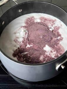 Ube powder added to coconut milk.