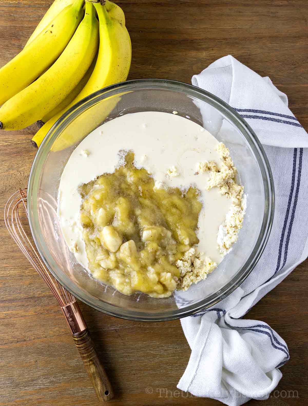 Mashed bananas added to batter.