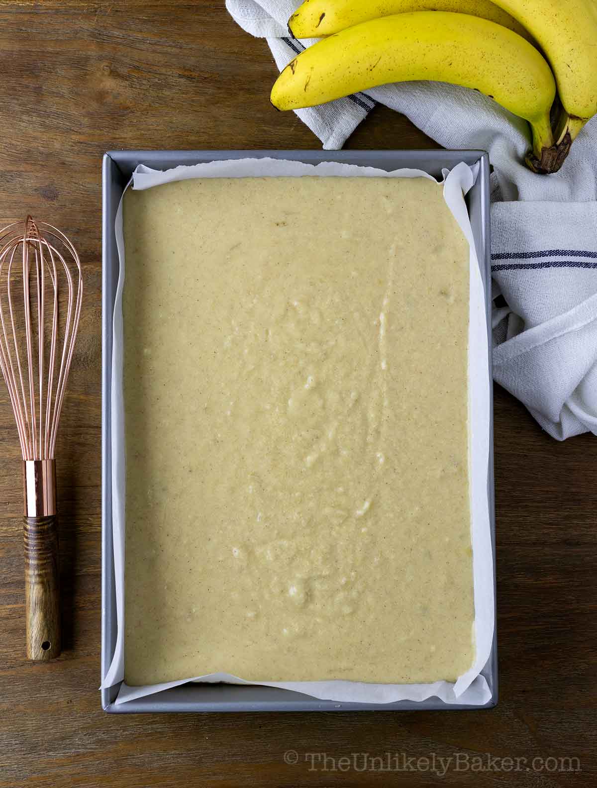 Mochi banana bread batter in a pan.