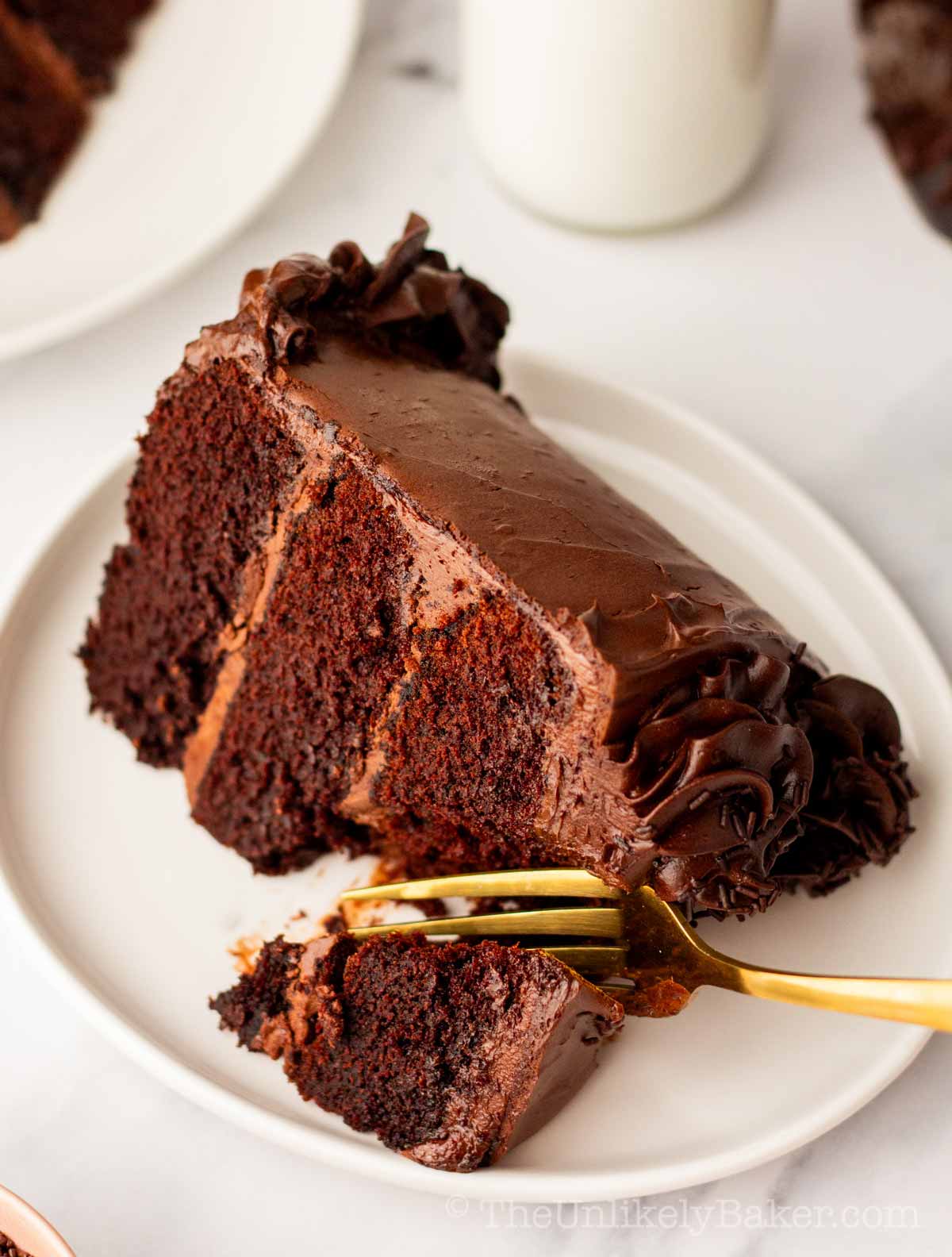 A slice of moist and tender chocolate overload cake.
