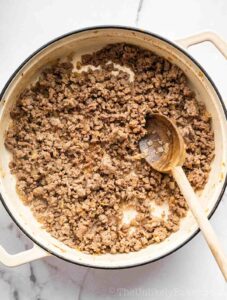 Cooked ground beef in a pan.