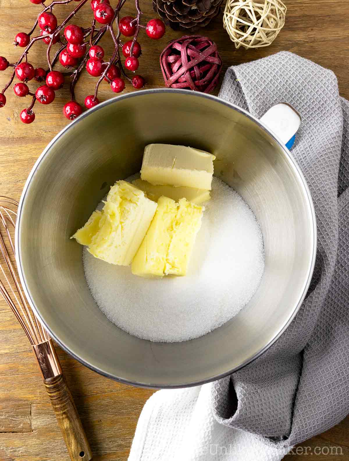 Butter and sugar in a bowl.