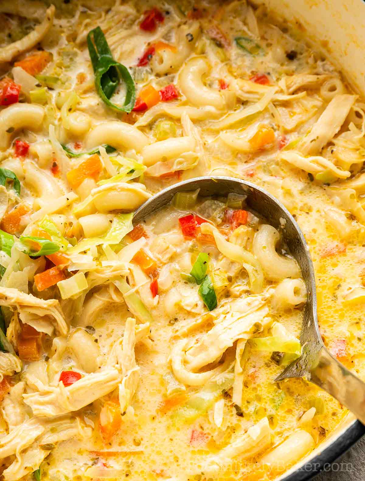 Filipino macaroni soup in a pot.