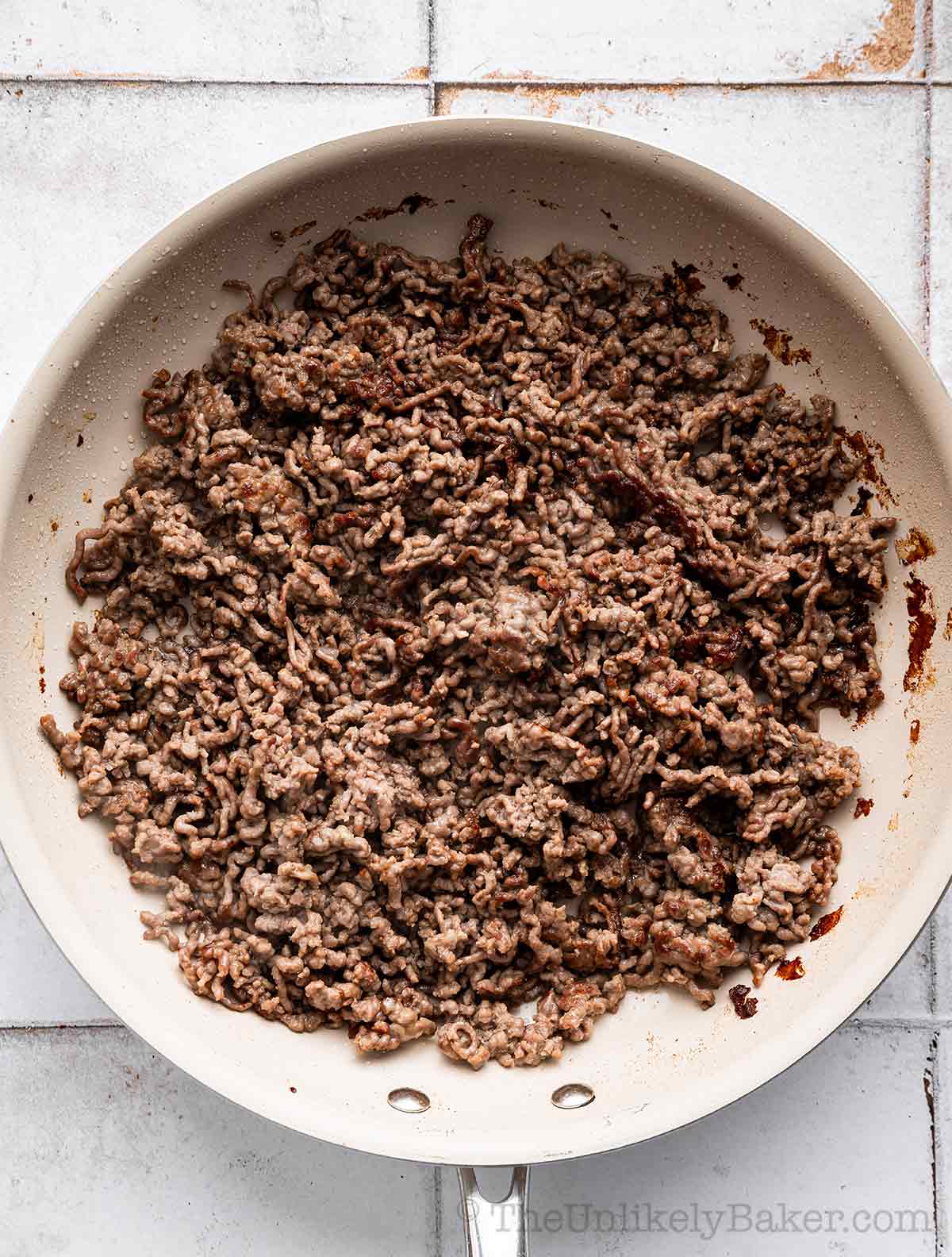 Ground beef in skillet.