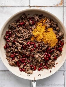 Taco seasoning added to ground beef.