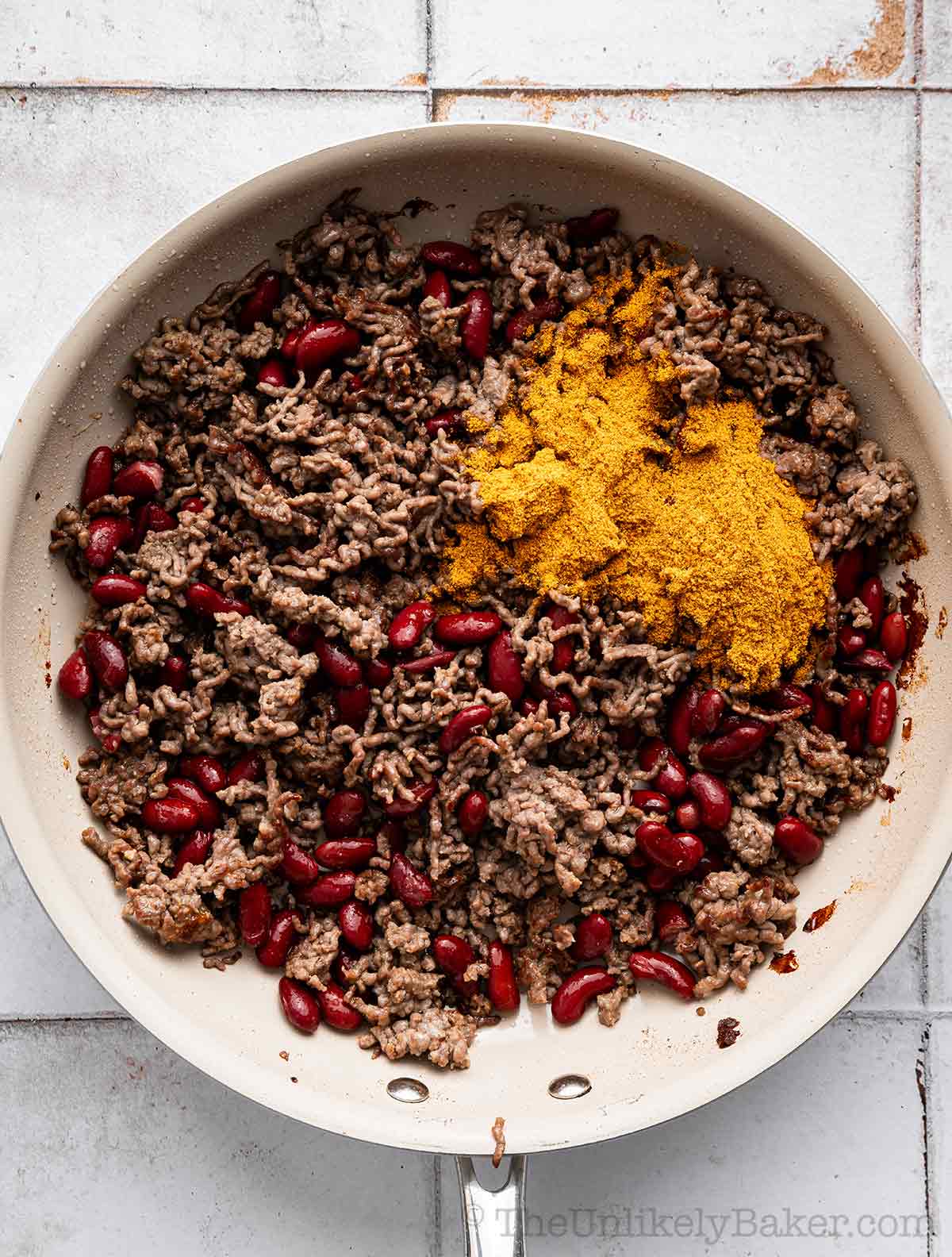 Taco seasoning added to ground beef.