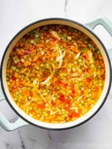 Cooked vegetables in a pot.