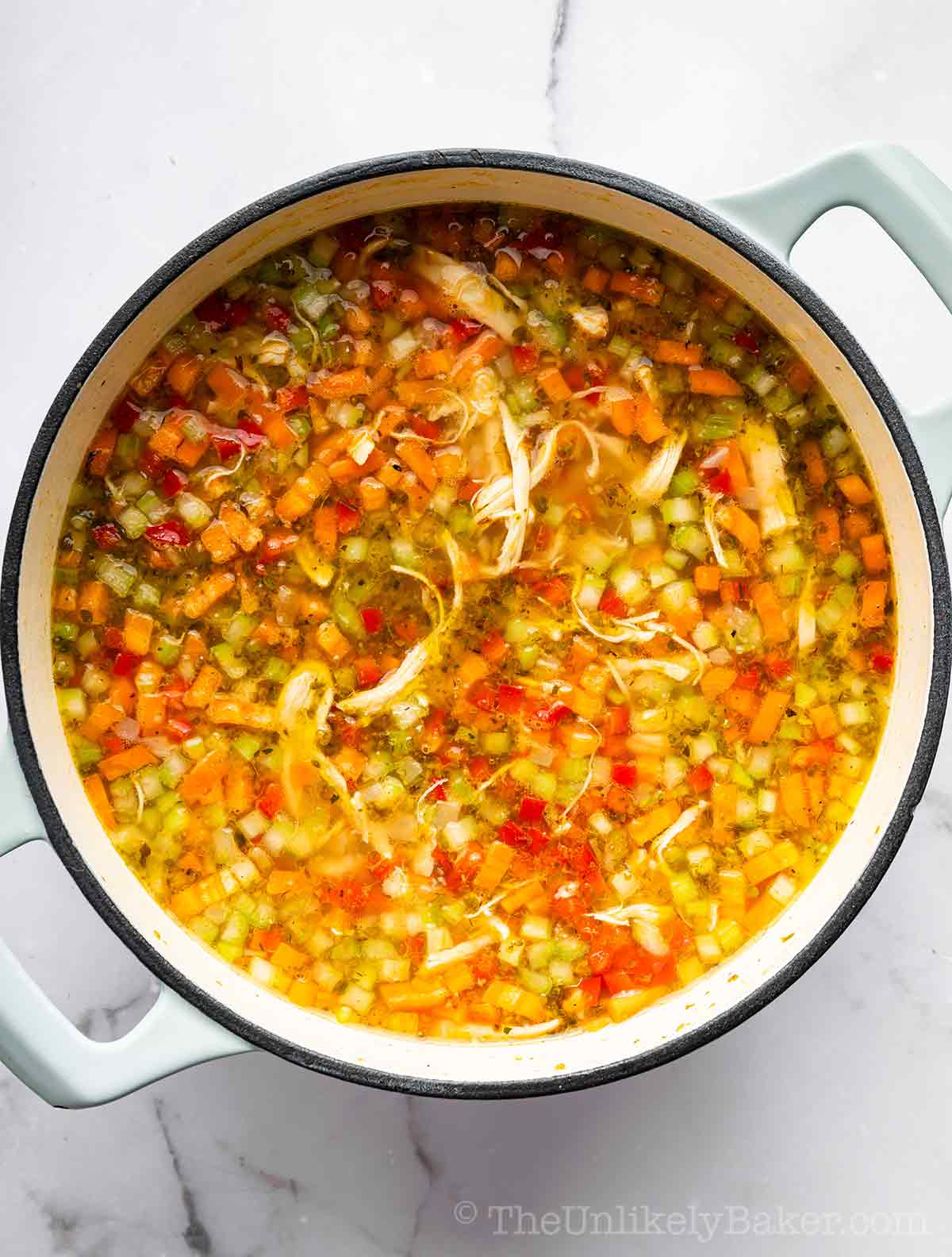 Cooked vegetables in a pot.
