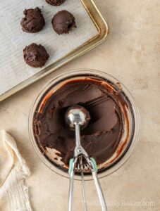 Chilled chocolate scooped into balls.