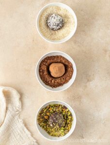 Truffles coated in coconut, cocoa and pistachio.