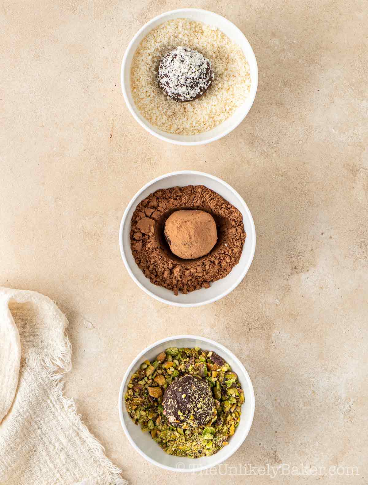 Truffles coated in coconut, cocoa and pistachio.