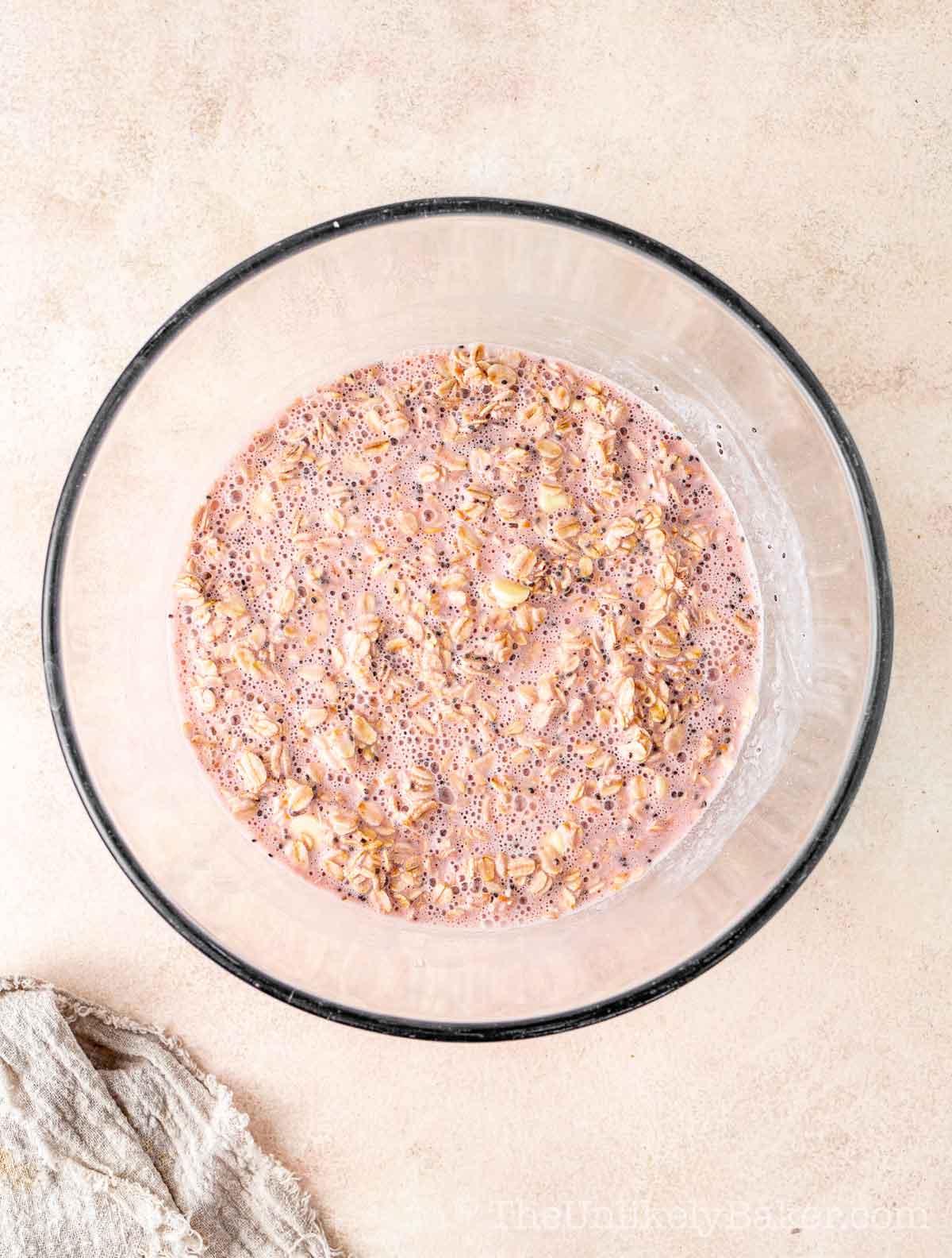 Raspberry oats mixture in a bowl.