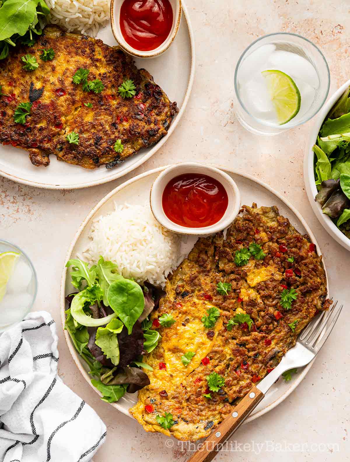 Tortang talong with giniling on a plate.