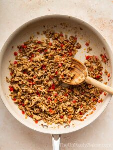 Ground pork mixture with seasoning.