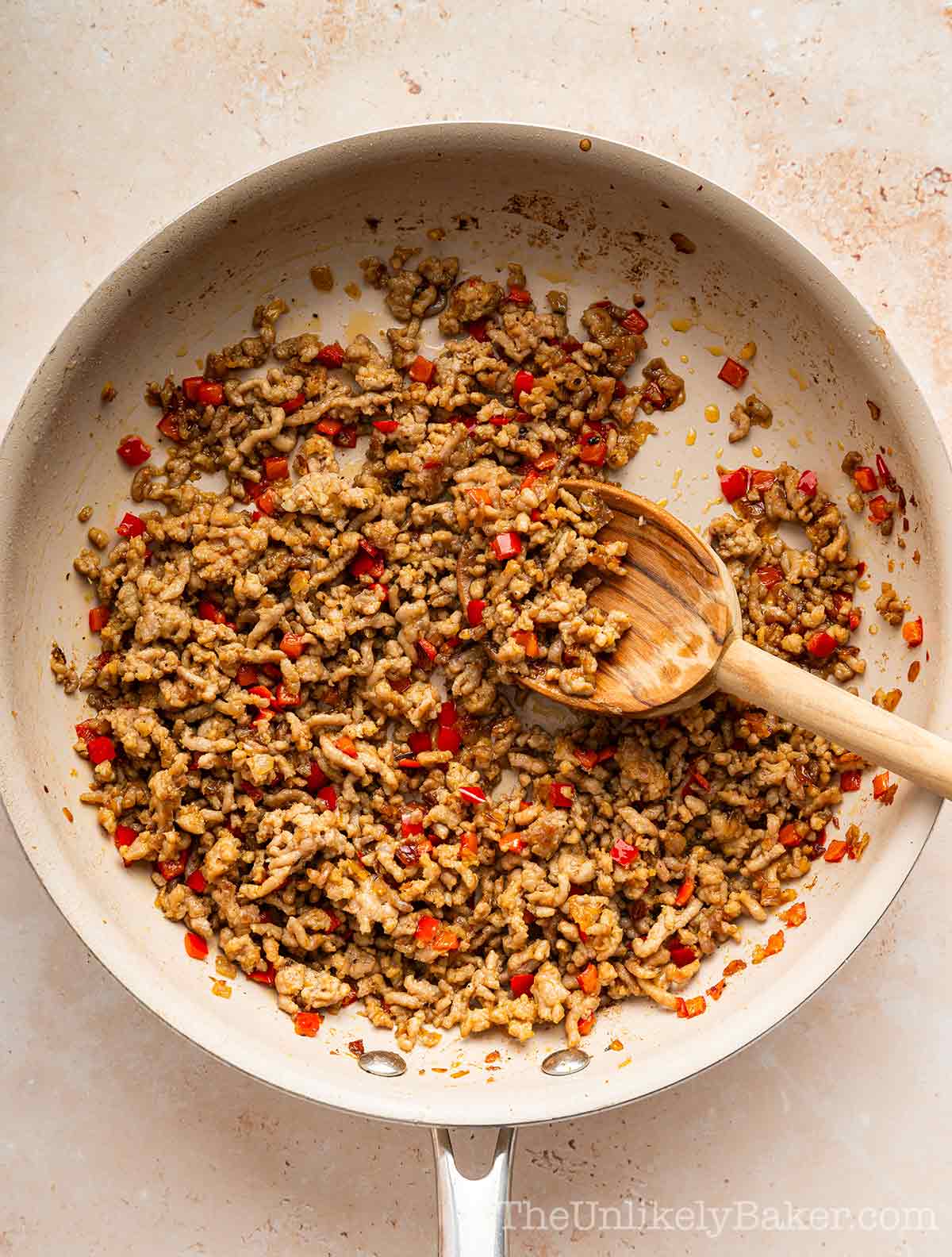 Ground pork mixture with seasoning.