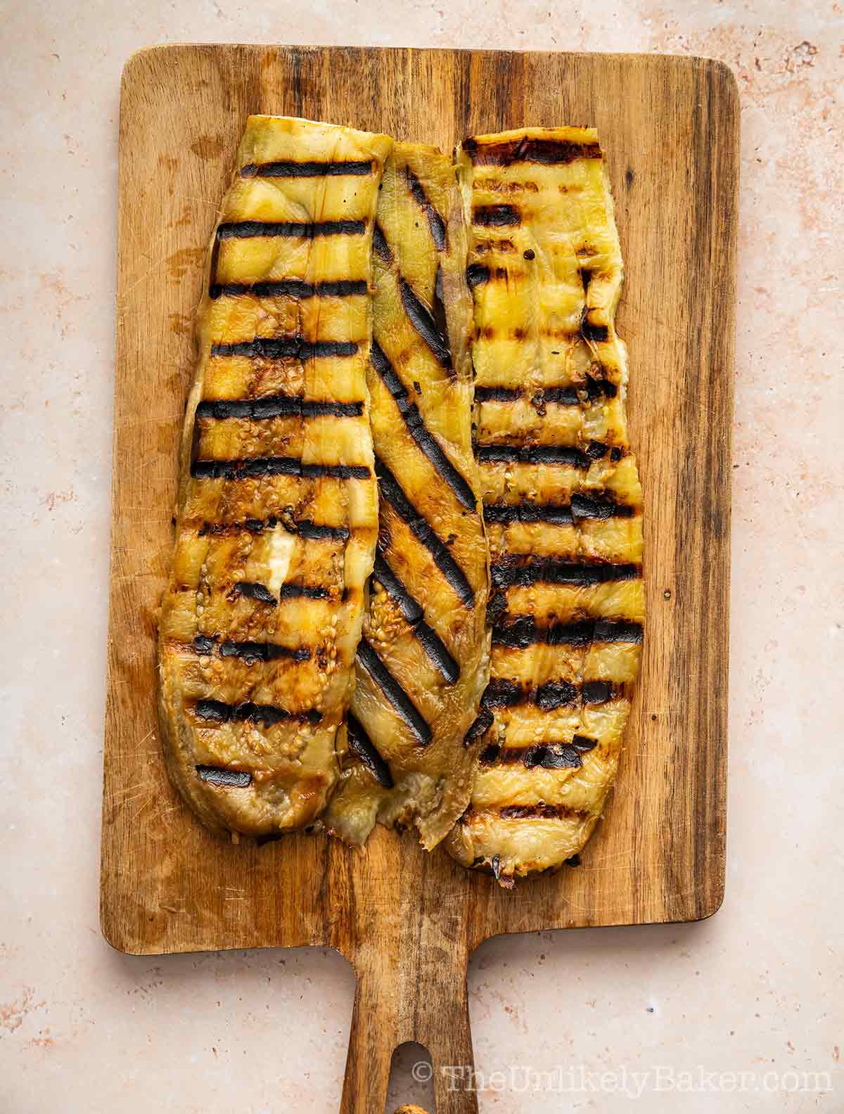 Grilled and peeled eggplants.