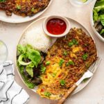 Tortang talong with rice and banana ketchup.