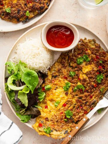 Tortang talong with rice and banana ketchup.