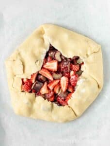 Pie dough folded over fruit filling.