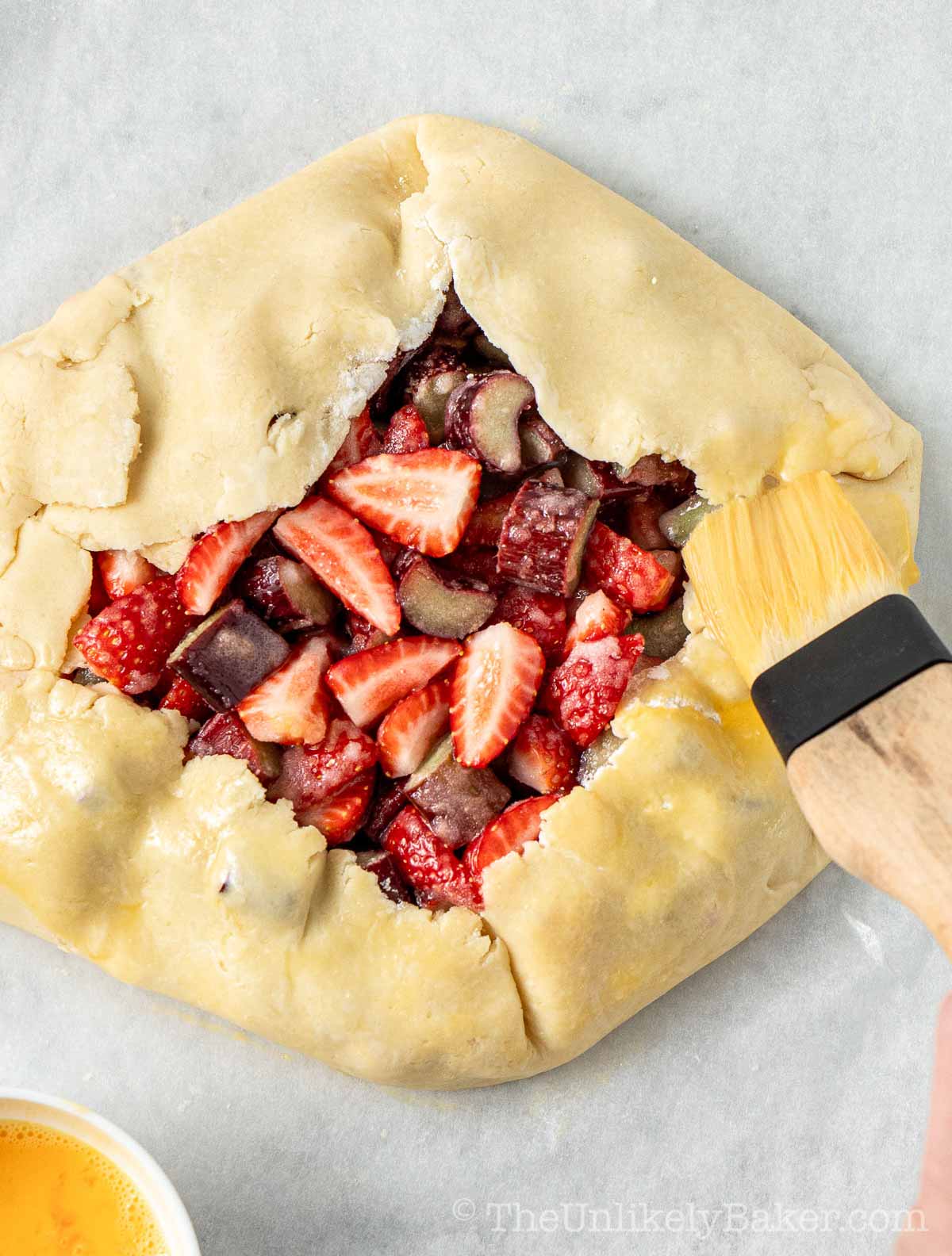 Crust brushed with egg wash.