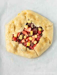 Cold butter and demerara sugar added to galette.