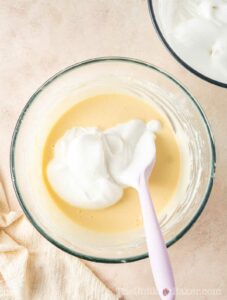 Meringue folded into cream cheese mixture.