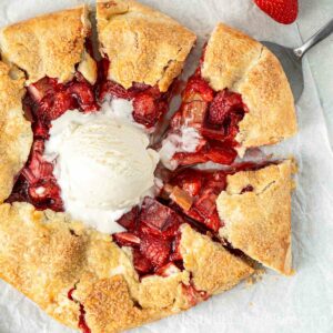 Strawberry and rhubarb galette with ice cream.