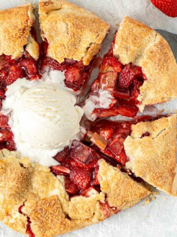 Strawberry and rhubarb galette with ice cream.