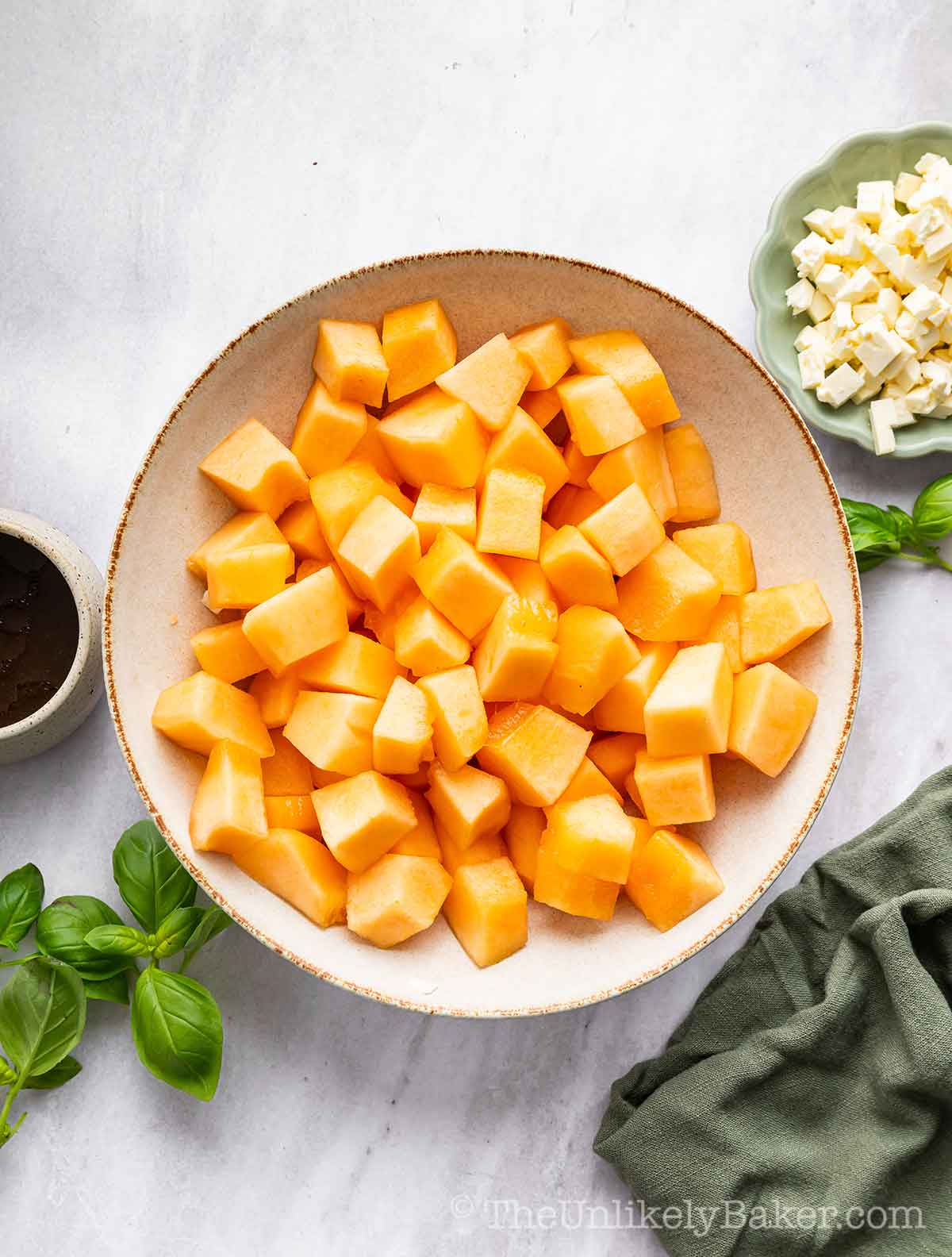 Diced cantaloupe in a bowl.