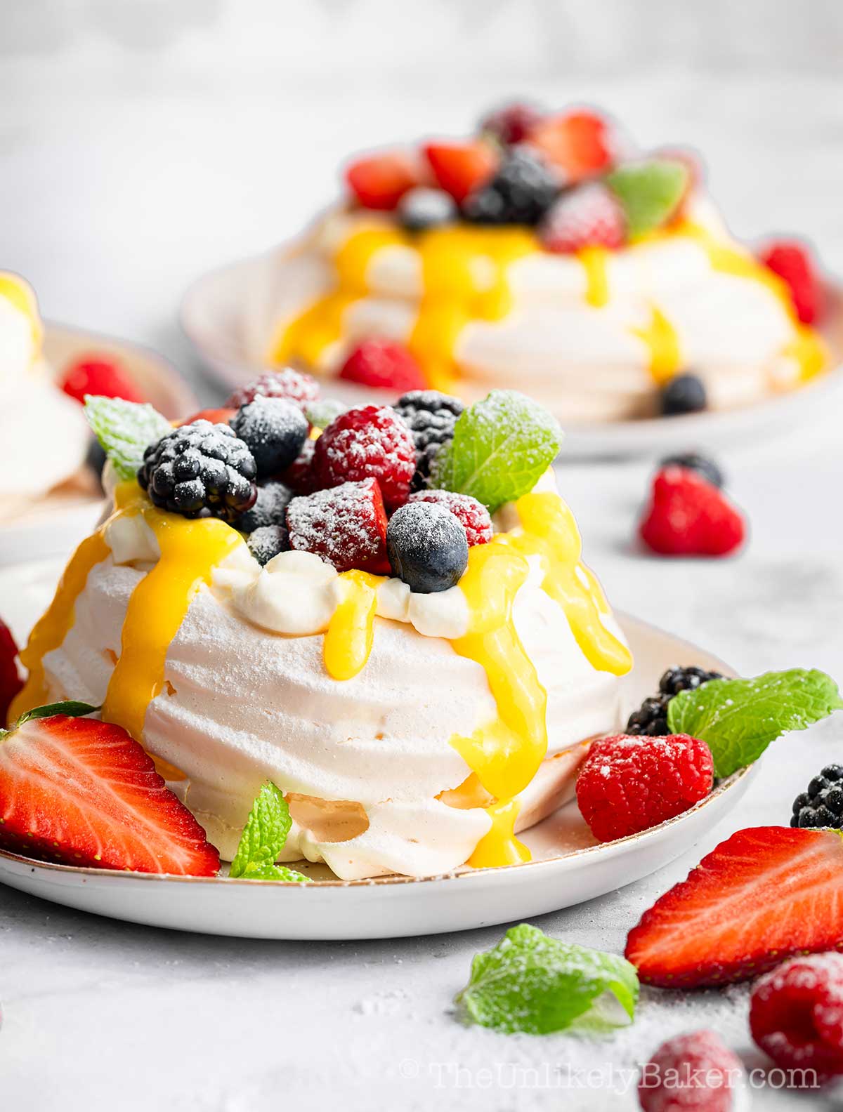 Pavlova lemon curd with fresh berries.