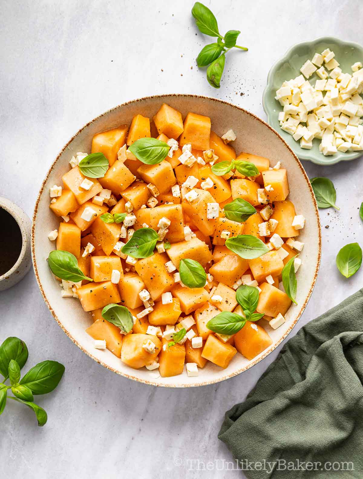 Fresh basil added to salad.