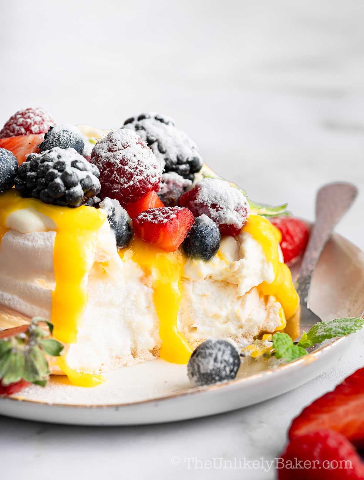 Pavlova lemon curd with berries.