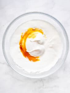 Vanilla extract added to egg white mixture.