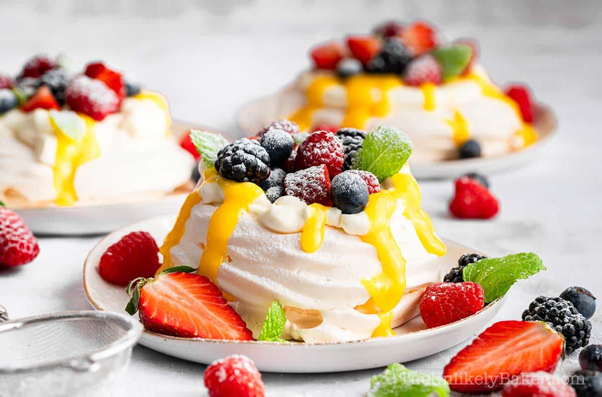 Lemon pavlova with berries and cream.