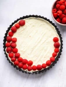 Fresh raspberries on top of white chocolate filling.