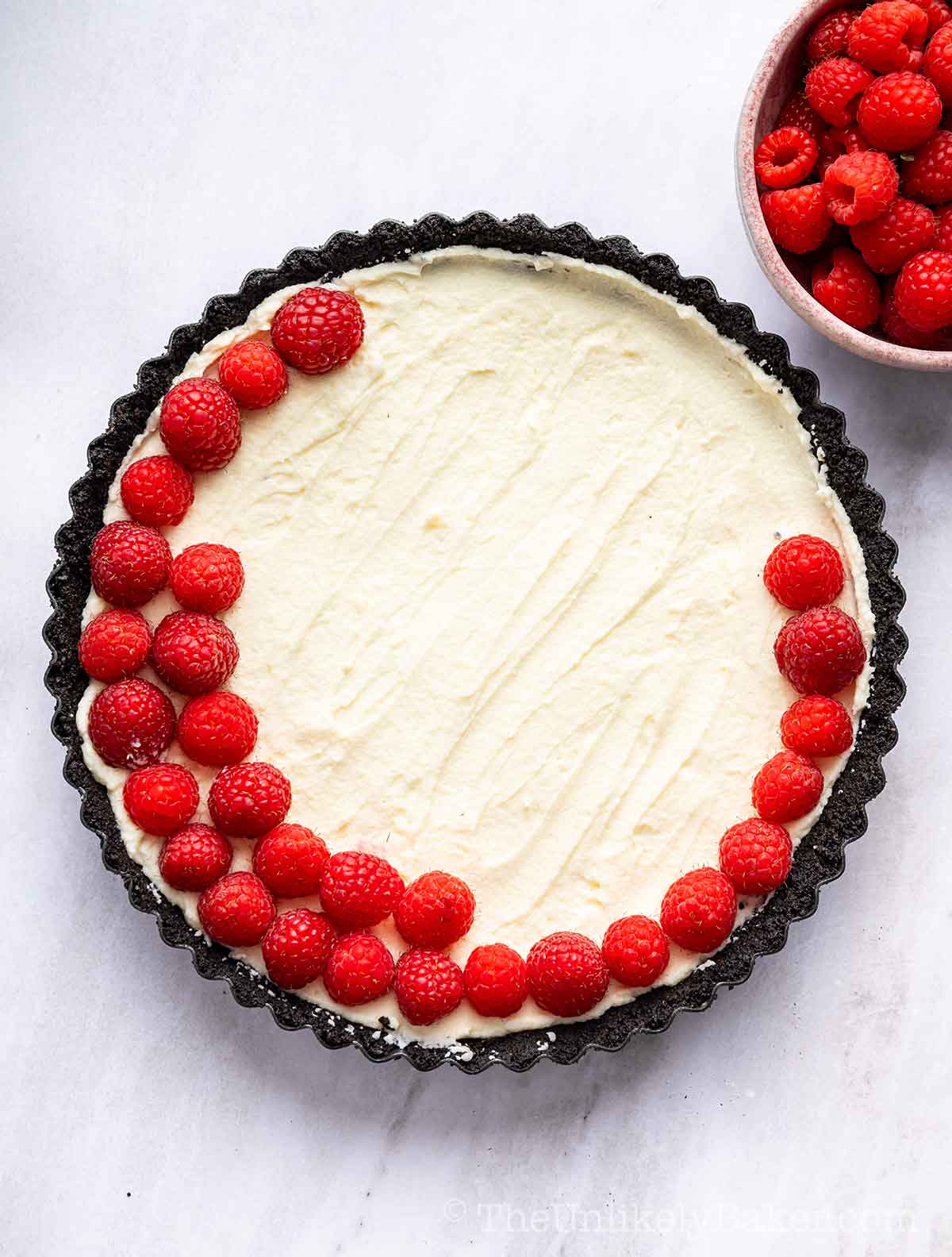 Fresh raspberries on top of white chocolate filling.