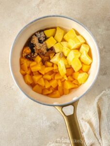 Fruit filling ingredients in a saucepan.