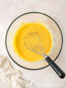 Mango milk mixture in a bowl.