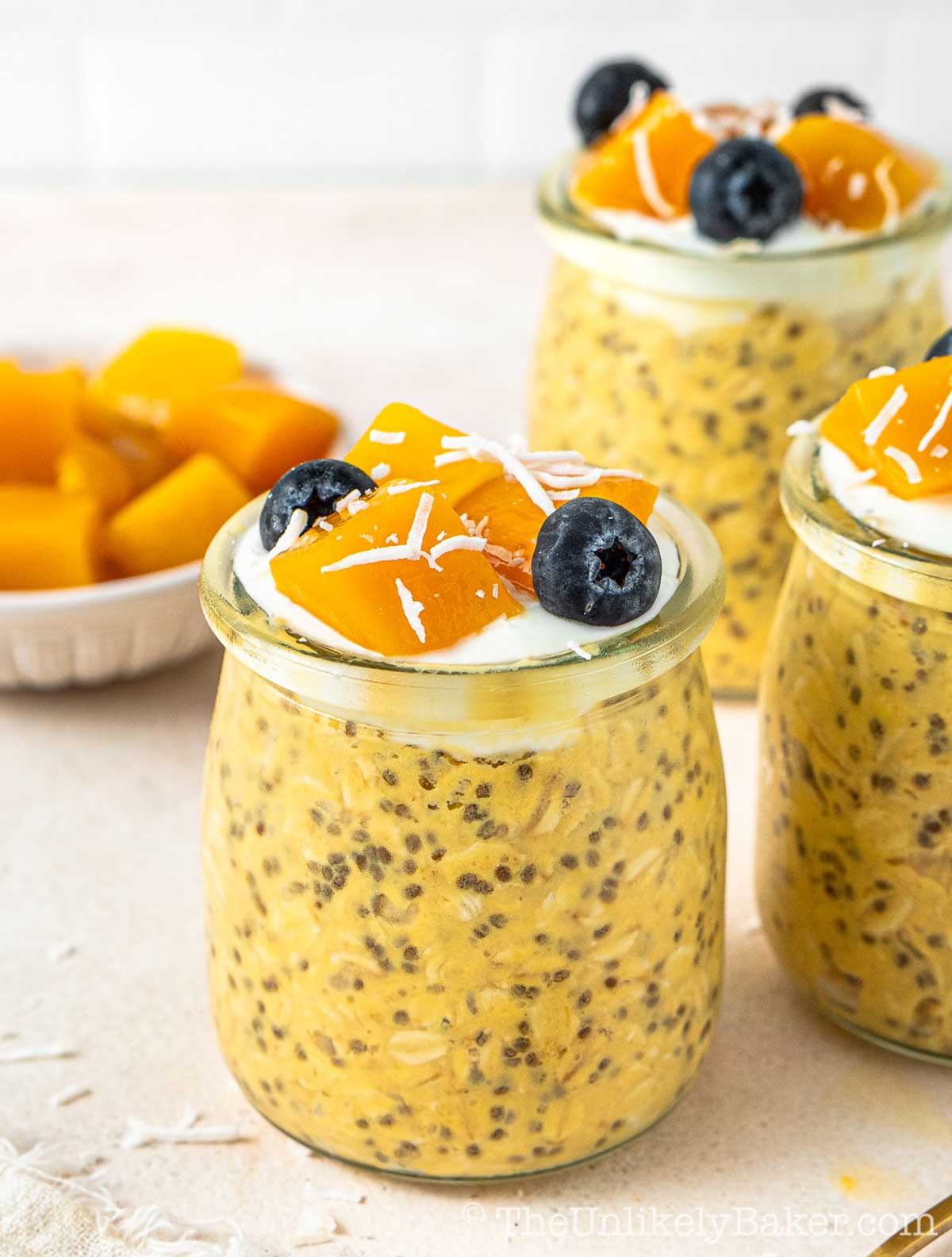 Mango oats topped with fresh fruit.