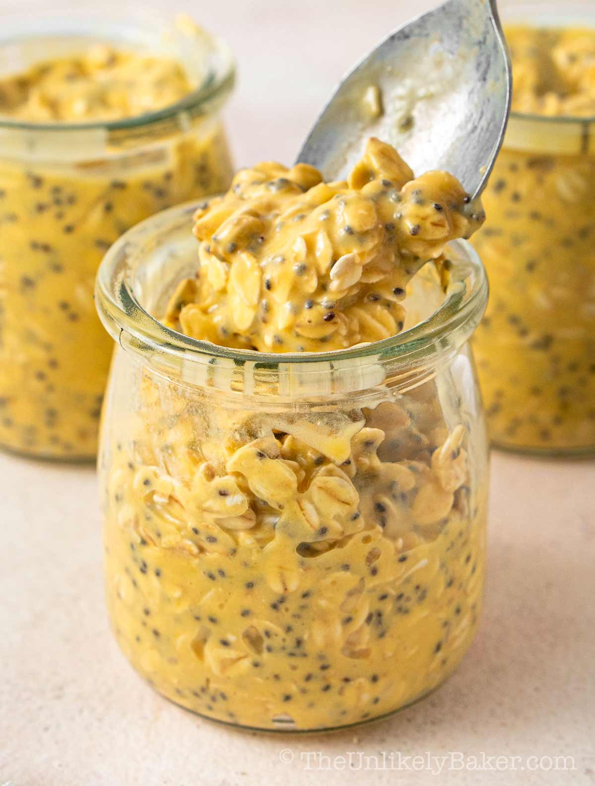 Creamy overnight oats with mango puree.