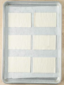 Puff pastry on baking sheet.