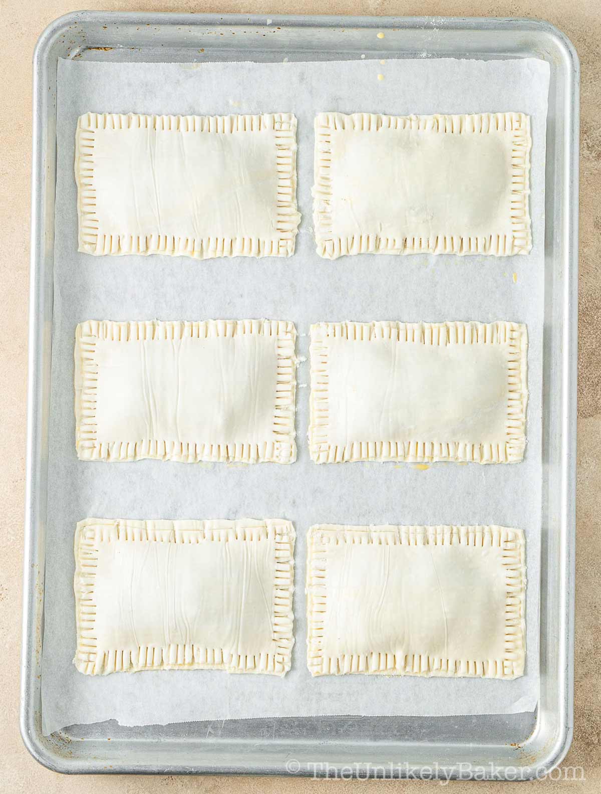 Crimped and sealed edges.