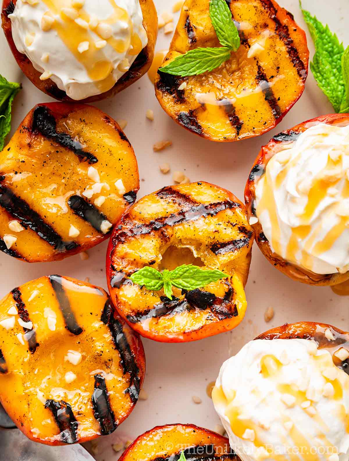 Grilled peaches with mascarpone drizzled with bourbon salted caramel.