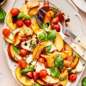 Fresh peach caprese salad with balsamic reduction.
